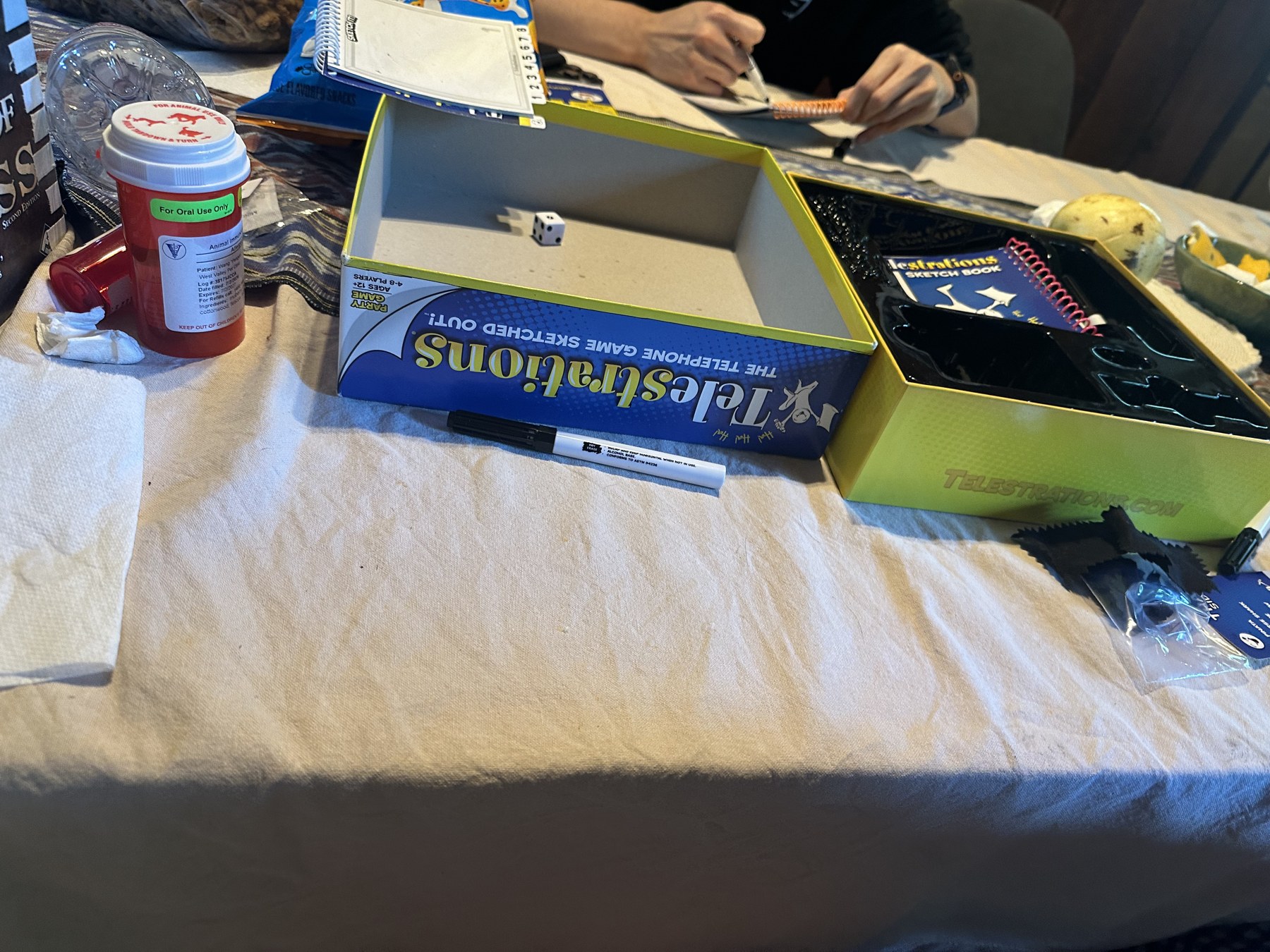 A board-game table during the Riverside House Labor Day weekend.
